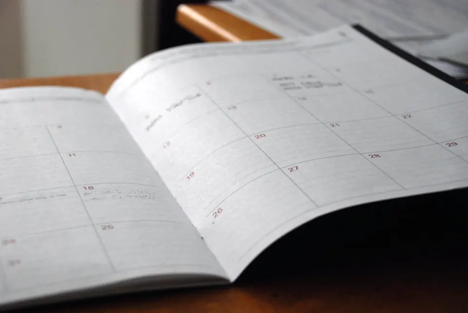 Appointment diary open on a clinic desk